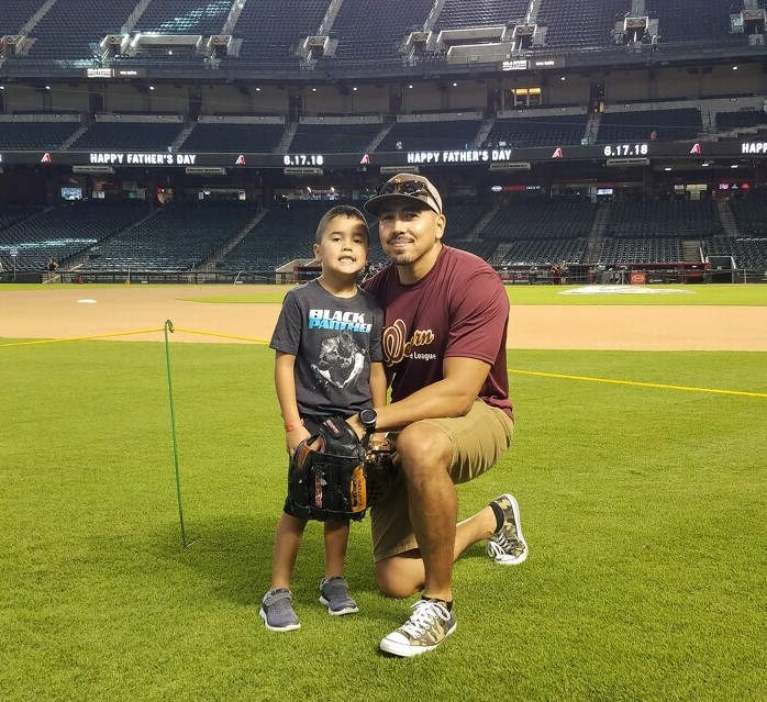 Father and Son At Baseball Game